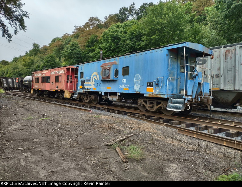 Faded red & blue cabooses